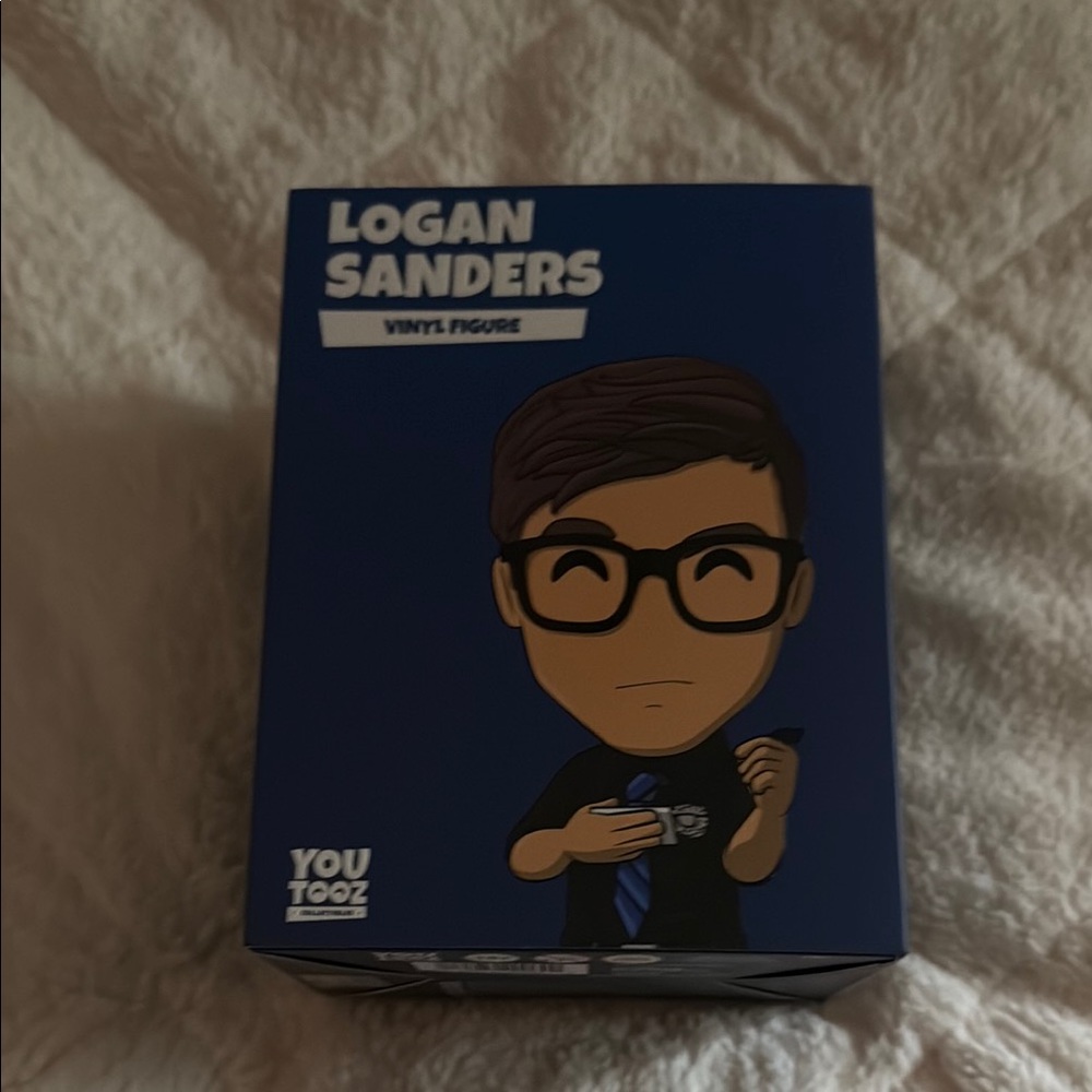 Logan Sanders Vinyl Figure - Blue and Black
